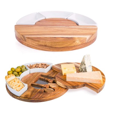 | comes with cutlery and a cup of | round bamboo cheese plate