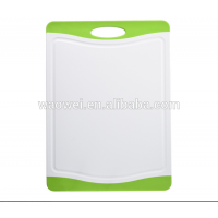 Plastic in White and Green Cutting Board